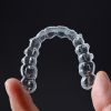 Digital Clear Aligner Design and Manufacturing with Attachments